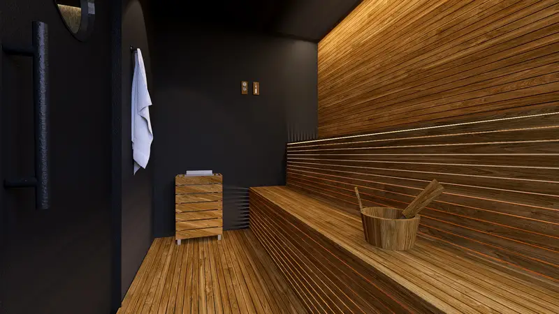 La sauna, forrada de madera de arriba abajo, con sus bancos corridos